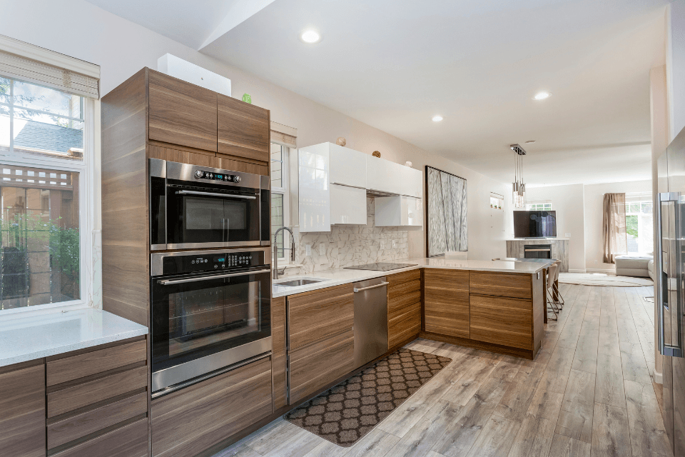 remodeling projects that can increase resale value remodeled kitchen with modern appliances custom built
