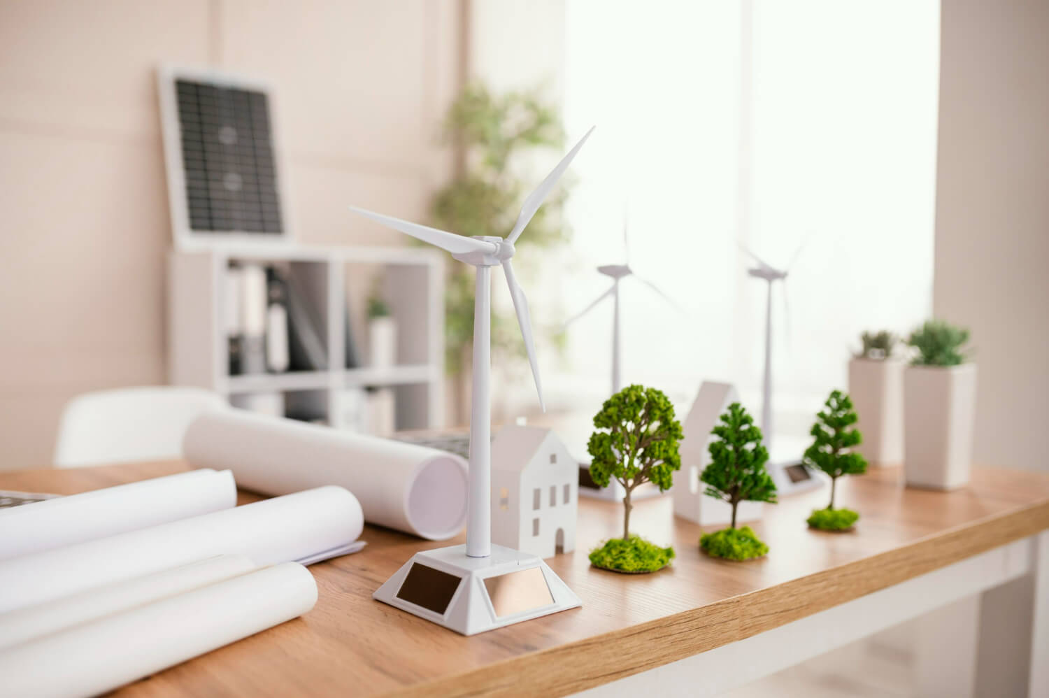 Various symbols of energy efficiency on a tabletop