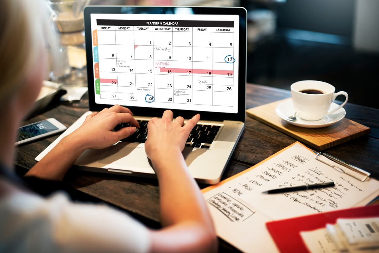 Person working on their kitchen remodel calendar